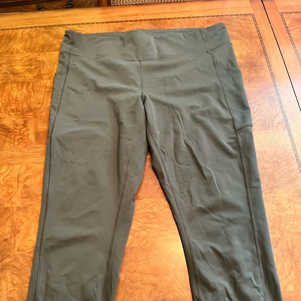 Good used condition olive lululemon leggings with side pockets